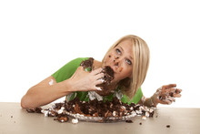 Woman Green Shirt With Cake Stuff In Mouth Look Up