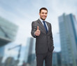 © Syda Productions - handsome buisnessman showing thumbs up