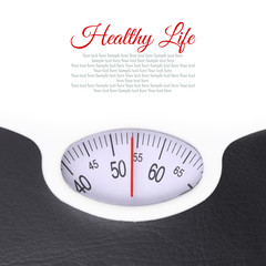 Close up of bathroom scale on white background