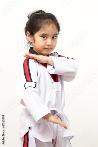 Foto Little asian child in fighting action on isolated background