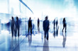 © Rawpixel.com - Silhouettes of Business People in Blurred Motion Walking