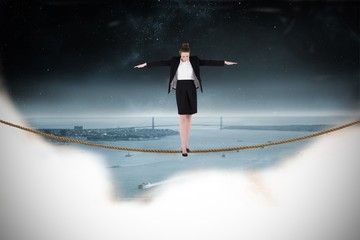 Aufkleber - Composite image of businesswoman performing a balancing act