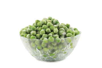 Wall Mural - Green frozen peas in a glass dish.