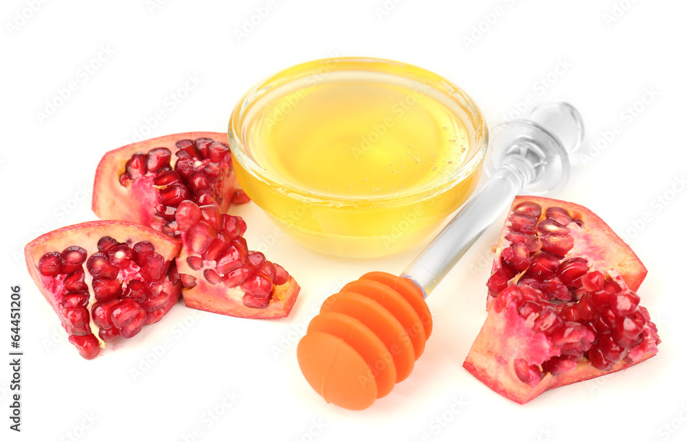 Sweet honey with pomegranate isolated on white