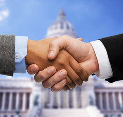 Poster - businessman and businesswoman shaking hands