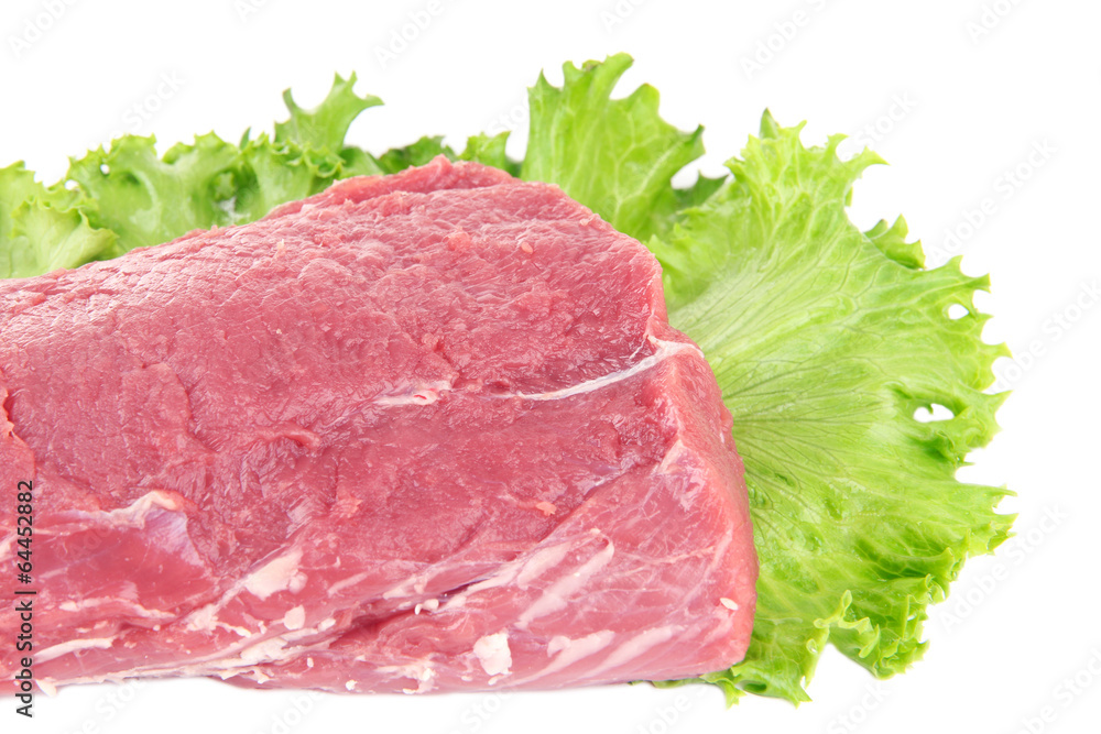Raw beef meat with lettuce isolated on white
