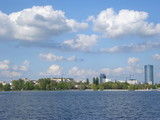 Fototapeta Tęcza - View of office buildings over Herastrau lake in Bucharest