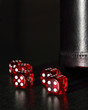 Red Dice with a Black Dice Cup