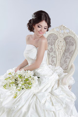 Canvas Print - Beautiful charming bride in a luxurious dress. Happy brunette gi