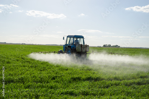 Cuadros en Lienzo Tractor spray fertilize field pesticide chemical