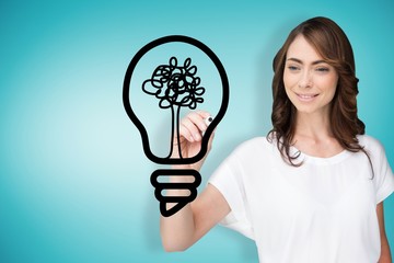 Wall Mural - Composite image of businesswoman drawing light bulb