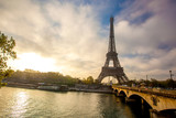 Fototapeta Miasta - Eiffel Tower with boat on Seine in Paris, France