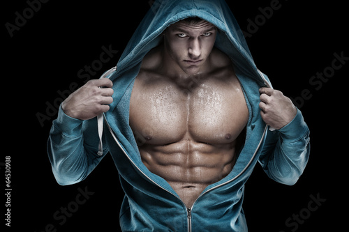 Obraz na płótnie canvas czteroczęściowy "tetraptyk" Silny, lekkoatletyczny mężczyzna fitness model tułowia pokazano sześć pack abs. 