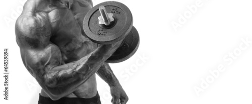 Naklejka - mata magnetyczna na lodówkę Bodybuilder training with heavy dumbbell, perfect body