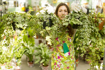 Wall Mural - Young woman in the garden