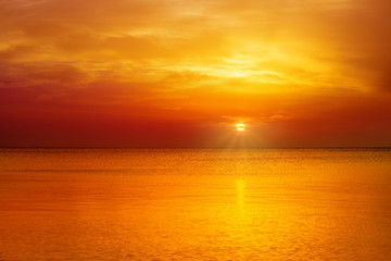 Wall Mural - Magic orange sunset over sea