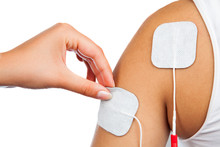 Electrodes Of Tens Device On Shoulder, Tens Therapy, Nerve Stimu