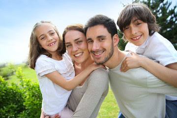 Wall Mural - Portrait of happy family of four