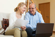 © JackF - Mature couple with documents and notebook