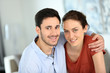 © goodluz - Portrait of loving couple at home
