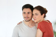 © goodluz - Portrait of loving couple looking away