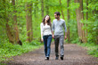 © Production Perig - Young couple having a walk in a forest