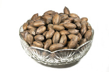 Unshelled Pecan Nuts In Decorative Glass Bowl