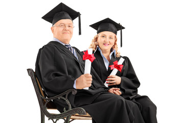 Poster - Mature people posing with diplomas