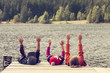© danmir12 - color image of three children siting on pontoon on lake
