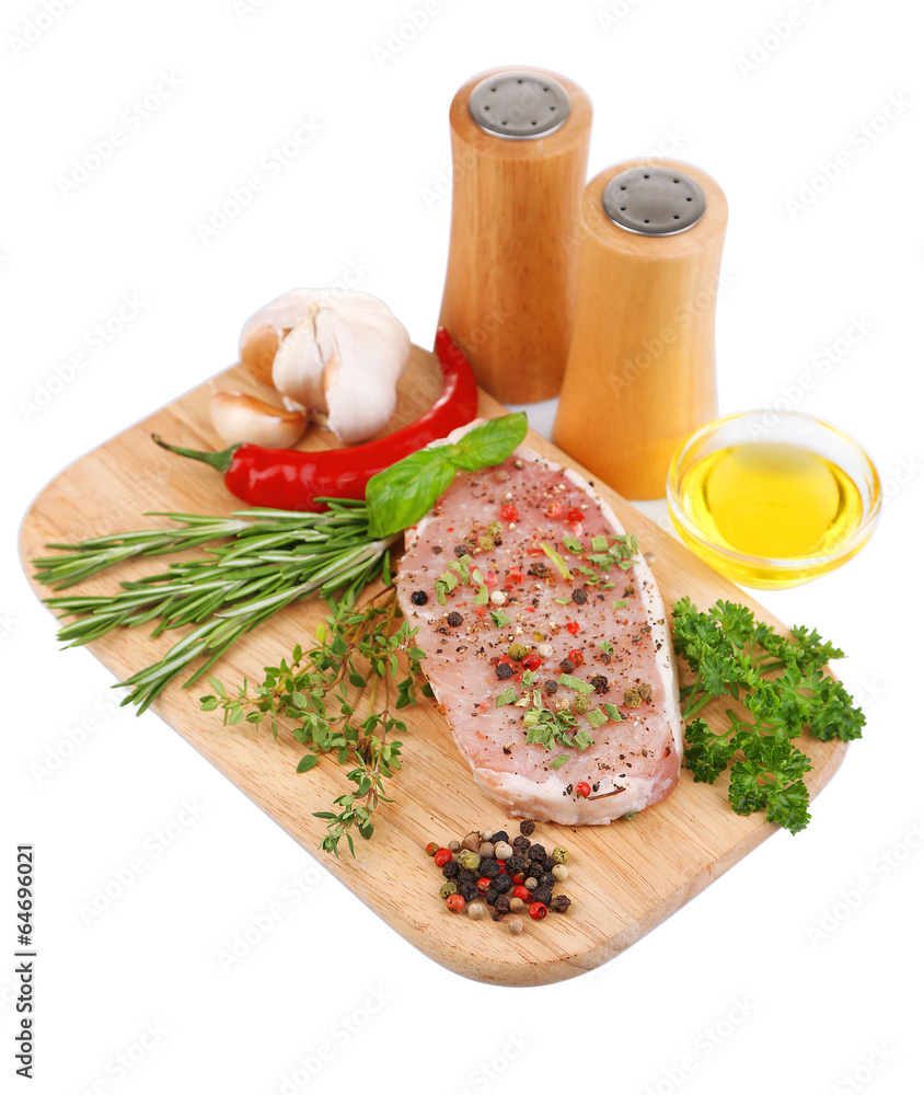 Raw meat steak with herbs and spices