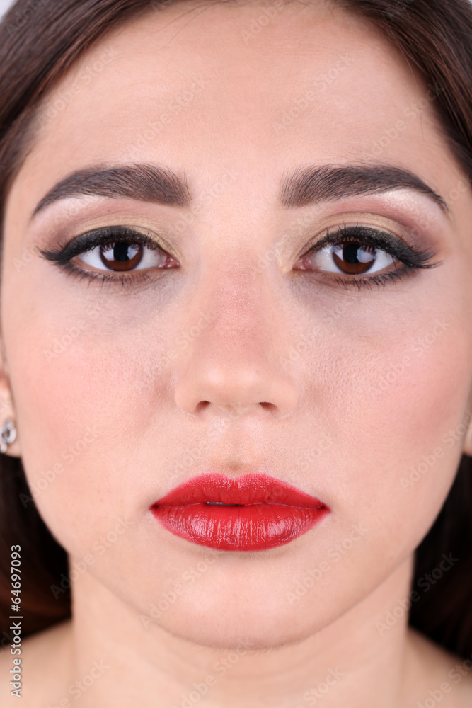 Girl with red lips closeup