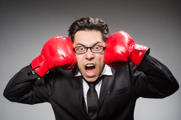 Funny boxer businessman in sport concept