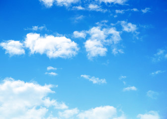 blue sky background with tiny clouds