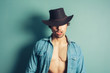 © LoloStock - Sexy young cowboy with open shirt