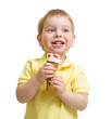 © Andrey Kuzmin - kid eating ice cream isolated on white studio shot