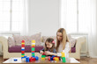 © BGStock72 - Mother and daughter playing in the room