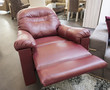 Red leather armchair in show room