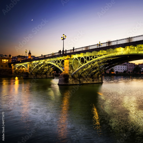 Plakat na papierze fotorealistycznym Most triana nad rzeką Gwadalkiwir, Sewilla i Andaluzja