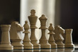 © Stratos Giannikos - conceprt with chess pieces and lighting on background