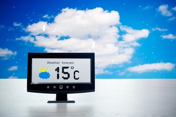 Wall Mural - Weather station device with weather conditions outside backgroun