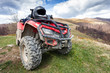 © Tiler84 - ATV on mountains landscape on a sunny day