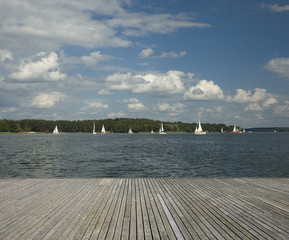 Canvas Print - Wooden jetty and yachts