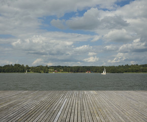 Canvas Print - Wooden jetty and yachts