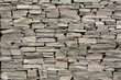 Stone wall constructed from raw stones