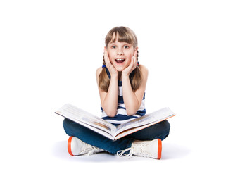 Wall Mural - girl reading a book on white background