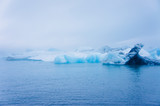 Fototapeta Morze - Beatiful vibrant picture of icelandic glacier and glacier lagoon