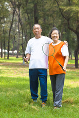 Sticker - smiling older sibling and sister holding badminton racket