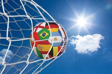 Aufkleber - Football in multi national colours at back of net