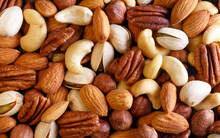 Background Texture Of Assorted Mixed Nuts Including Cashew Nuts,