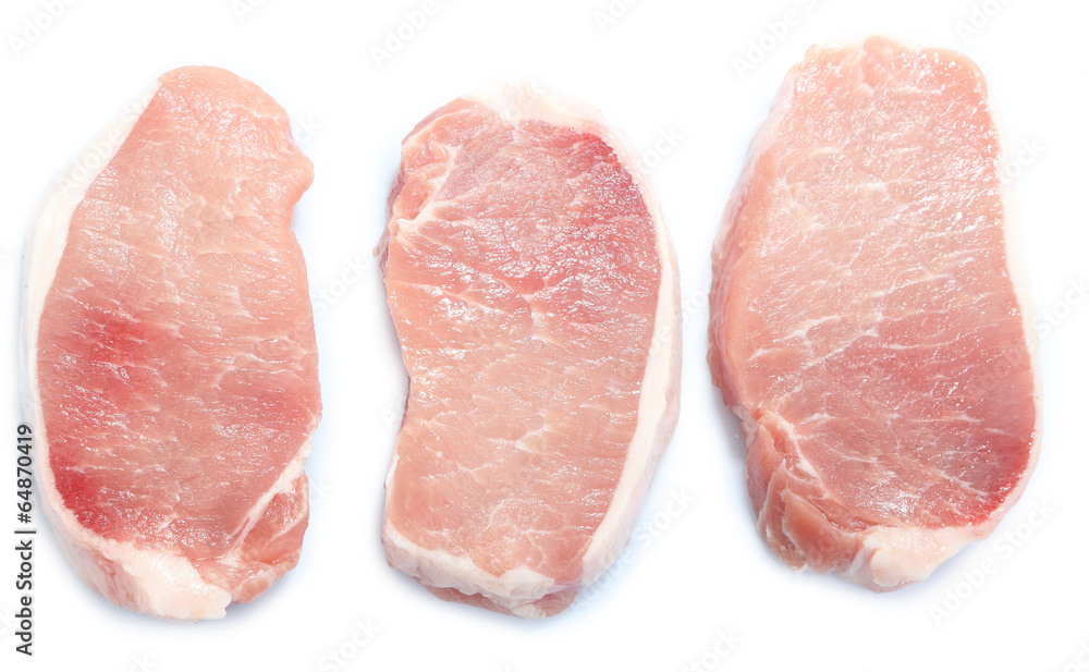 Raw meat steaks isolated on white